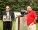 Gerry Samolyk receives the Peltier Award presented by Roger Kolman
