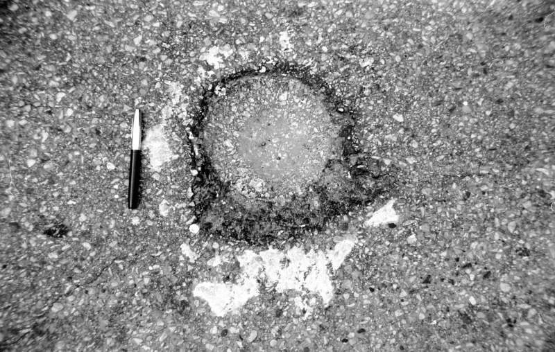 Manitowoc - Sputnik Fragment Hole in Street