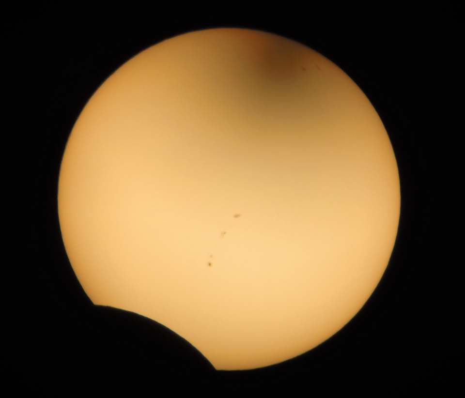 Sun - 
		Start of Partial Eclipse Phase by Gene Hanson 