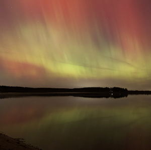 Auroral reflections by Chad Andrist 